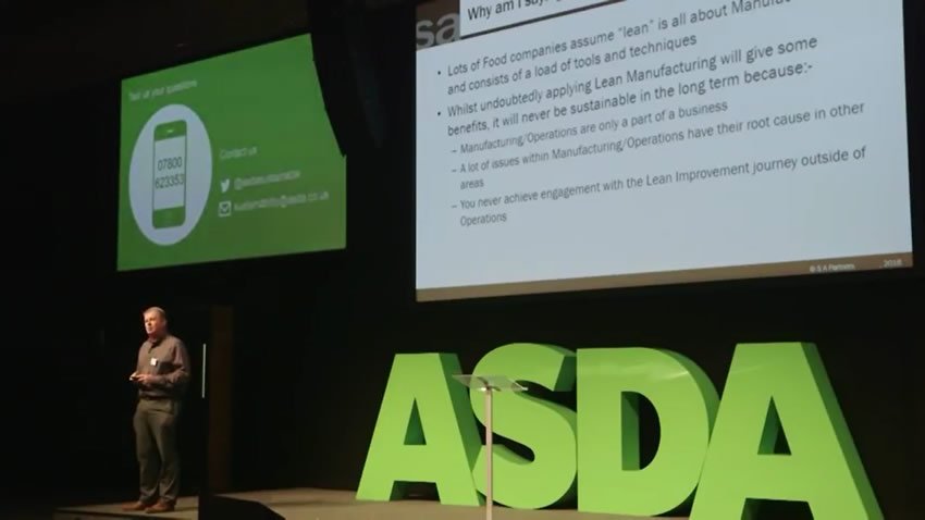Jeff on stage at the Asda conference