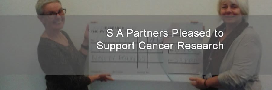 cheque award to cancer research