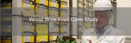 image of employee holding box of avocados
