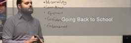 James talking in front of white board