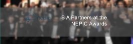 banner showing blurred award winners at the NEPIC awards ceremony