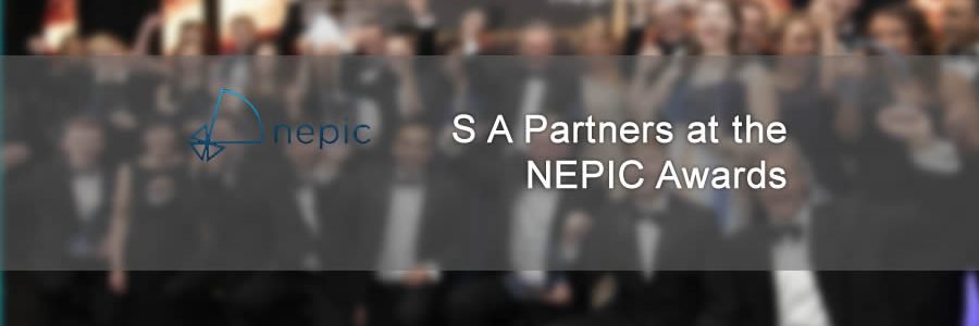 banner showing blurred award winners at the NEPIC awards ceremony